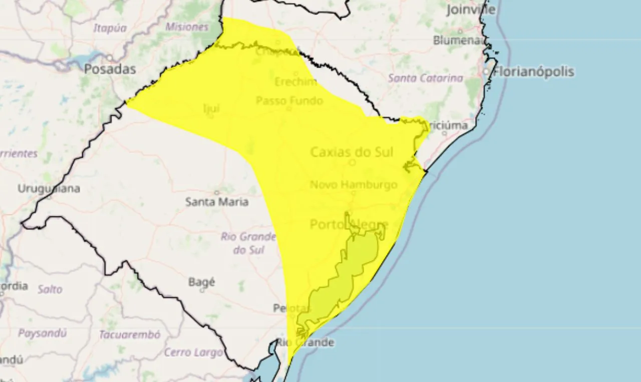 A imagem mostra as áreas em alerta para chuva, raios e ventos em partes do estado gaúcho e catarinense